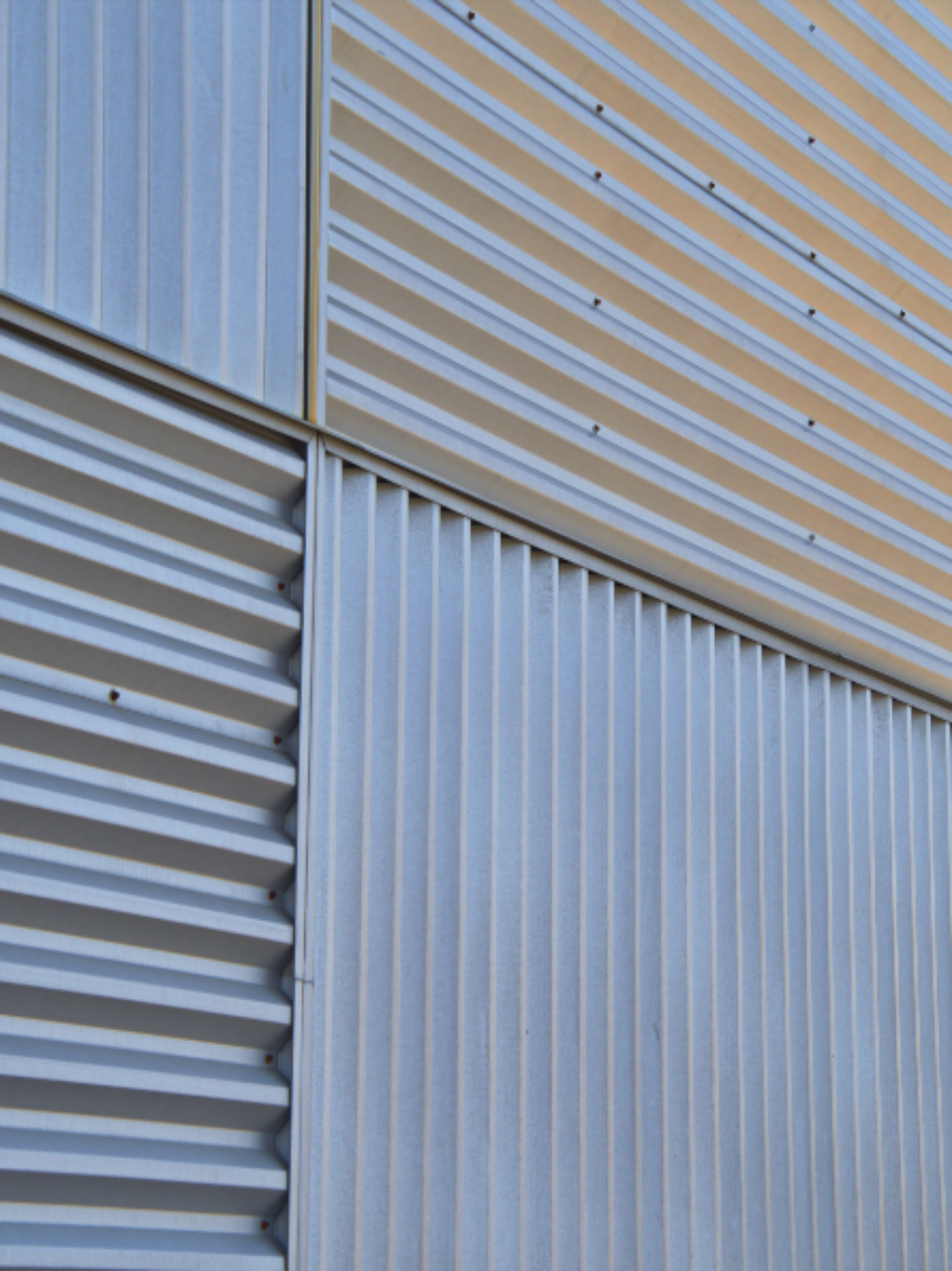 Architectural metal cladding panels on a commercial building facade