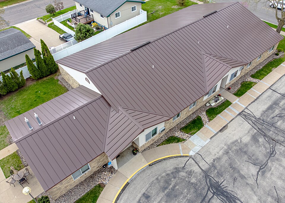 Standing seam metal roof on a low-slope commercial building